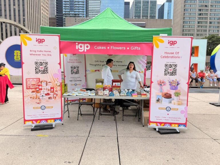 The igp booth at Panorama India, Nathan Phillips Square, Toronto, with brand ambassadors behind the product table